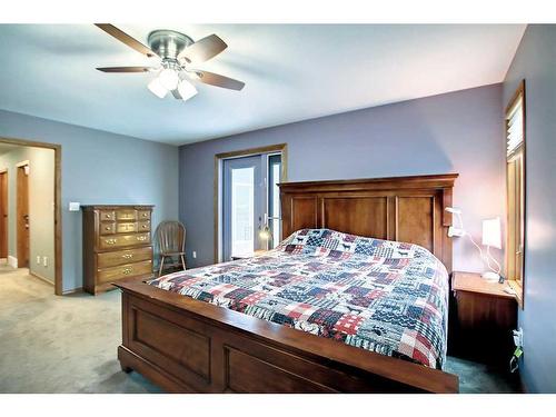 25 Ravenscrag Crescent, Norglenwold, AB - Indoor Photo Showing Bedroom