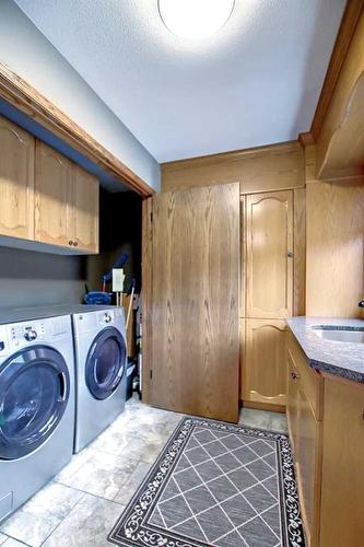 25 Ravenscrag Crescent, Norglenwold, AB - Indoor Photo Showing Laundry Room