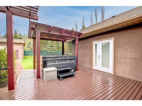 25 Ravenscrag Crescent, Norglenwold, AB - Outdoor With Deck Patio Veranda With Exterior