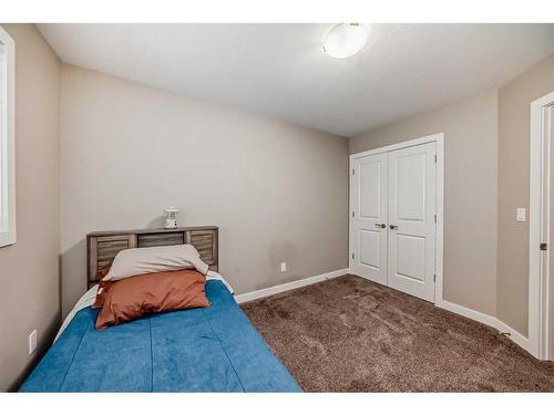 51 Reid Court, Sylvan Lake, AB - Indoor Photo Showing Bedroom