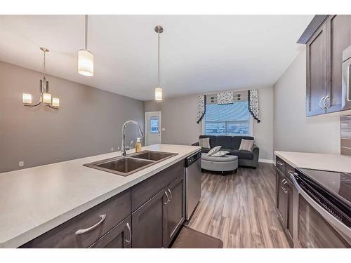 51 Reid Court, Sylvan Lake, AB - Indoor Photo Showing Kitchen With Double Sink