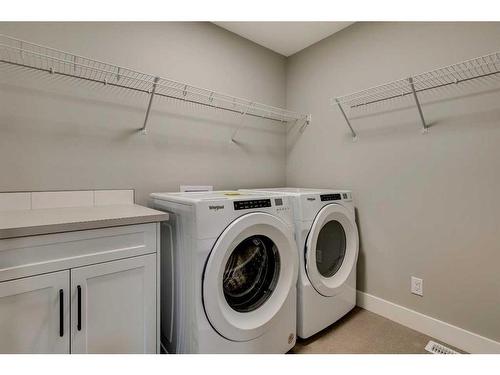 52 Legacy Forest Landing Se, Calgary, AB - Indoor Photo Showing Laundry Room