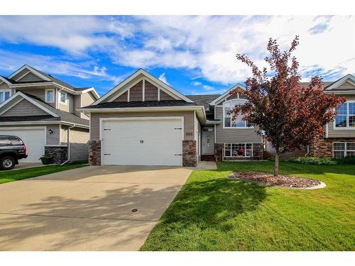 7123 Henner'S Road, Lacombe, AB - Outdoor With Facade