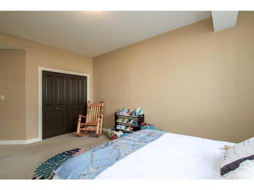 7123 Henner'S Road, Lacombe, AB - Indoor Photo Showing Bedroom