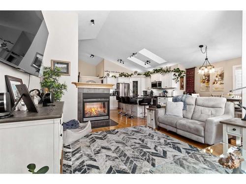 116 Ingle Close, Red Deer, AB - Indoor Photo Showing Living Room With Fireplace