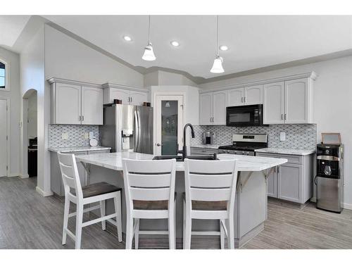 5 Landsdown Green, Sylvan Lake, AB - Indoor Photo Showing Kitchen With Upgraded Kitchen