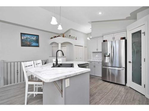 5 Landsdown Green, Sylvan Lake, AB - Indoor Photo Showing Kitchen With Double Sink With Upgraded Kitchen