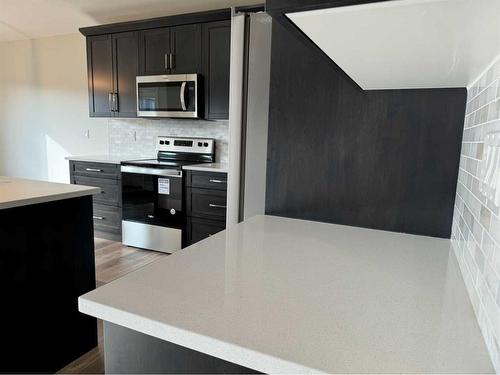 4745 Aspen Lakes Boulevard, Blackfalds, AB - Indoor Photo Showing Kitchen