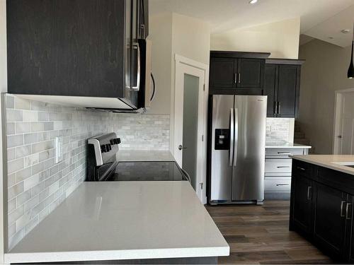 4745 Aspen Lakes Boulevard, Blackfalds, AB - Indoor Photo Showing Kitchen With Stainless Steel Kitchen With Double Sink