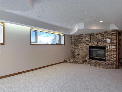 38172 Highway 766, Rural Red Deer County, AB - Indoor With Fireplace