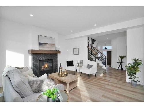 244 Emerald Drive, Red Deer, AB - Indoor Photo Showing Living Room With Fireplace