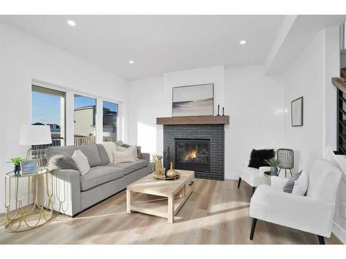 244 Emerald Drive, Red Deer, AB - Indoor Photo Showing Living Room With Fireplace