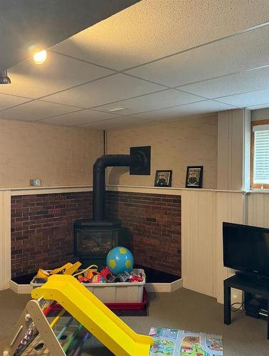 5117 52 Street, Rocky Mountain House, AB - Indoor With Fireplace