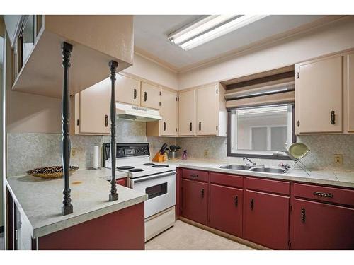 5406 49 Avenue, Camrose, AB - Indoor Photo Showing Kitchen With Double Sink