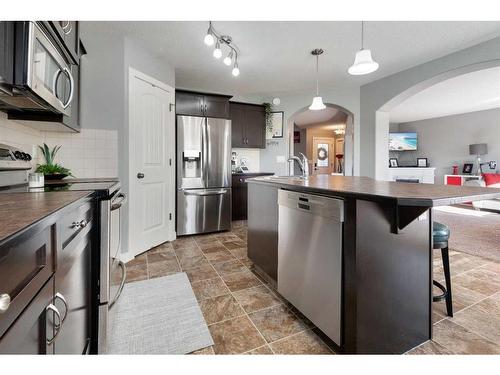 113 Larsen Crescent, Red Deer, AB - Indoor Photo Showing Kitchen With Upgraded Kitchen