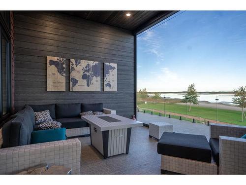 141 Lakeshore Drive, Rural Camrose County, AB - Outdoor With Body Of Water With Deck Patio Veranda With Exterior