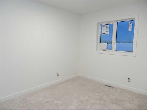 91 Aurora Heights Boulevard, Blackfalds, AB - Indoor Photo Showing Other Room