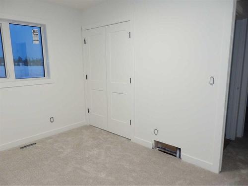 91 Aurora Heights Boulevard, Blackfalds, AB - Indoor Photo Showing Other Room