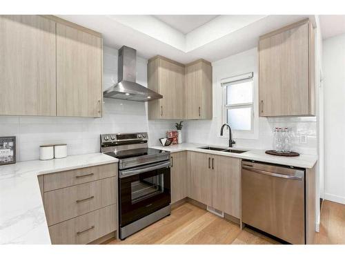 895 Mahogany Boulevard Se, Calgary, AB - Indoor Photo Showing Kitchen With Double Sink