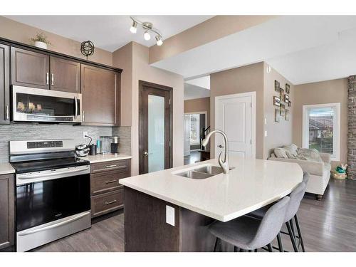 162 Voisin Close, Red Deer, AB - Indoor Photo Showing Kitchen With Double Sink With Upgraded Kitchen