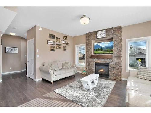 162 Voisin Close, Red Deer, AB - Indoor Photo Showing Living Room With Fireplace