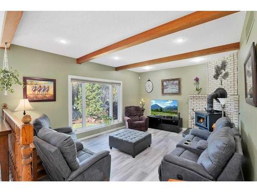 5420 58A Street Crescent, Lacombe, AB - Indoor Photo Showing Living Room With Fireplace