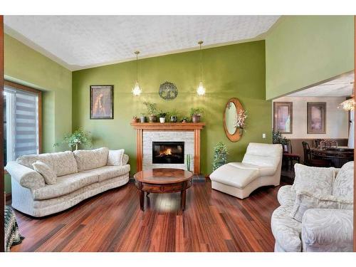 5420 58A Street Crescent, Lacombe, AB - Indoor Photo Showing Living Room With Fireplace