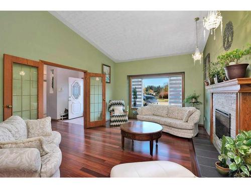 5420 58A Street Crescent, Lacombe, AB - Indoor Photo Showing Living Room With Fireplace