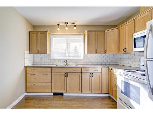 5516 35 Street, Red Deer, AB - Indoor Photo Showing Kitchen With Double Sink