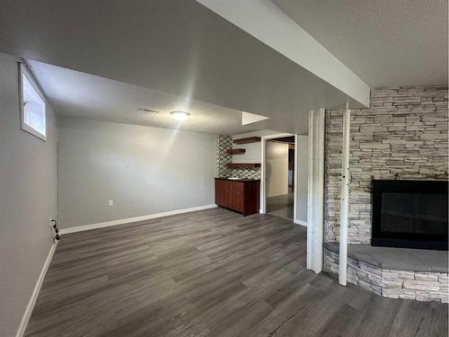 5421 51 Street, Camrose, AB - Indoor With Fireplace