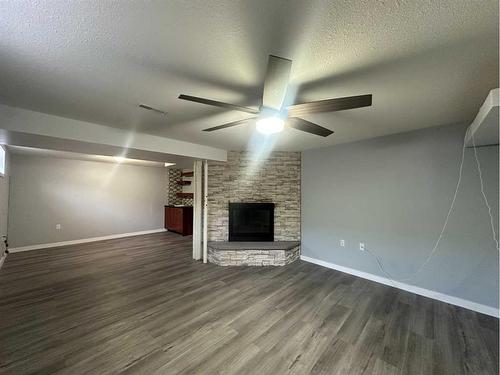 5421 51 Street, Camrose, AB - Indoor With Fireplace