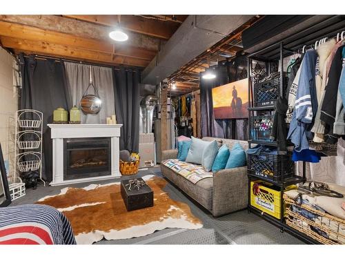 5135 52 Avenue, Bashaw, AB - Indoor Photo Showing Living Room With Fireplace