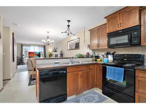 24 Long Close, Red Deer, AB - Indoor Photo Showing Kitchen With Double Sink