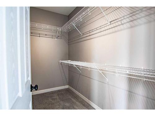 54 Metcalf Way, Lacombe, AB - Indoor With Storage