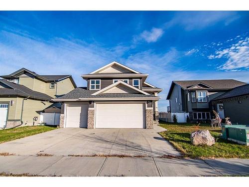 54 Metcalf Way, Lacombe, AB - Outdoor With Facade