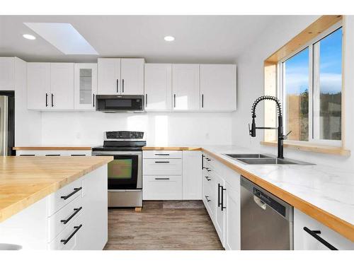 212 Nordegg Industrial Close, Nordegg, AB - Indoor Photo Showing Kitchen With Double Sink