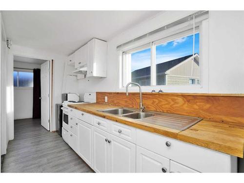 212 Nordegg Industrial Close, Nordegg, AB - Indoor Photo Showing Kitchen With Double Sink