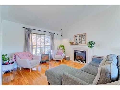 45 Dowler Street, Red Deer, AB - Indoor Photo Showing Living Room With Fireplace