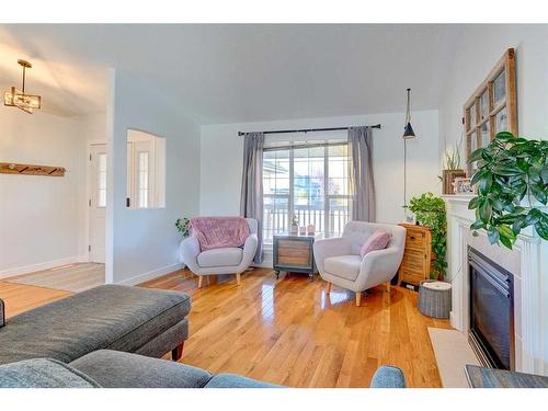 45 Dowler Street, Red Deer, AB - Indoor Photo Showing Living Room With Fireplace