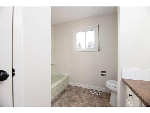 4706 C & E Trail, Lacombe, AB - Indoor Photo Showing Bathroom