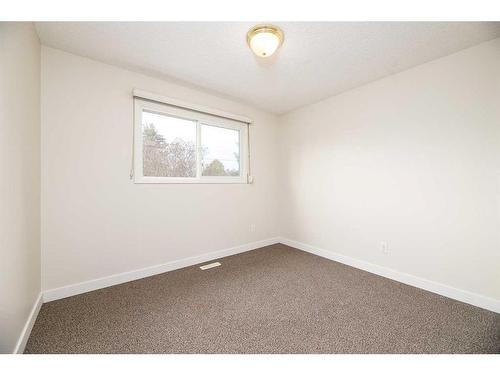 4706 C & E Trail, Lacombe, AB - Indoor Photo Showing Other Room