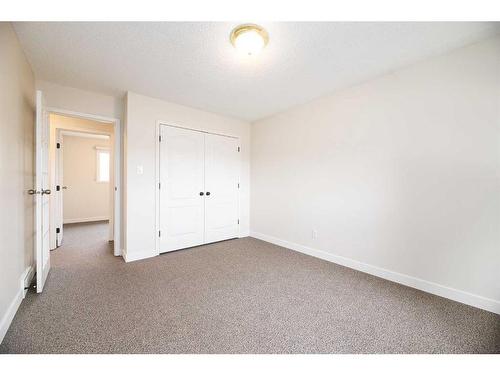 4706 C & E Trail, Lacombe, AB - Indoor Photo Showing Other Room