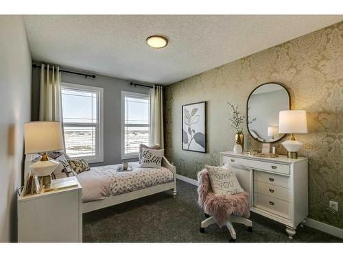 12 Snowberry Lane North, Okotoks, AB - Indoor Photo Showing Bedroom