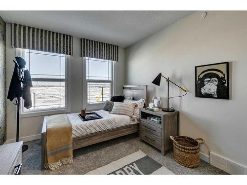 12 Snowberry Lane North, Okotoks, AB - Indoor Photo Showing Bedroom