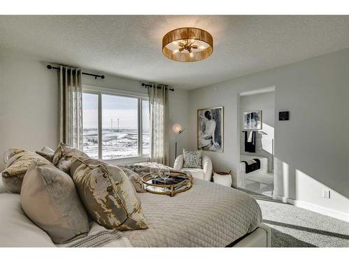 12 Snowberry Lane North, Okotoks, AB - Indoor Photo Showing Bedroom