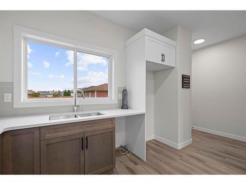 7309B 44B Avenue, Camrose, AB - Indoor Photo Showing Kitchen With Double Sink