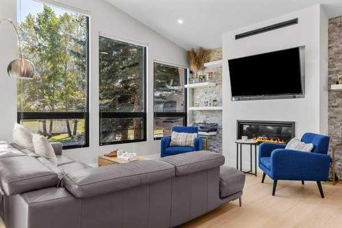 1010 14 Street, Canmore, AB - Indoor Photo Showing Living Room With Fireplace