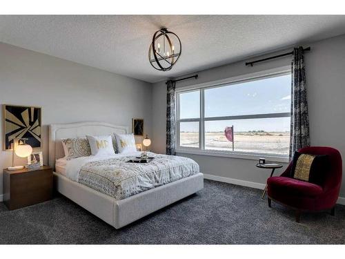 51 Dawson Wharf Mount, Chestermere, AB - Indoor Photo Showing Bedroom