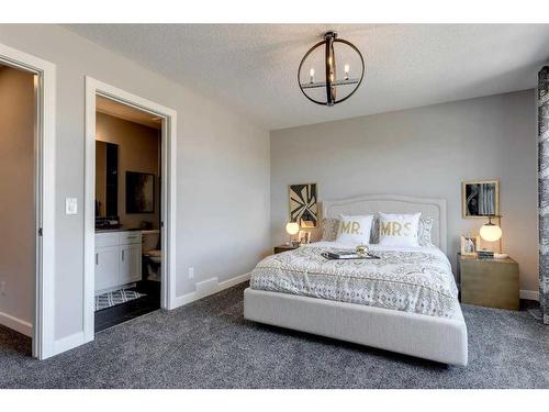 51 Dawson Wharf Mount, Chestermere, AB - Indoor Photo Showing Bedroom