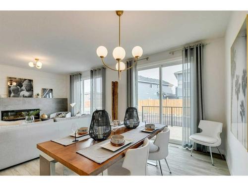 55 Dawson Wharf Mount, Chestermere, AB - Indoor With Fireplace